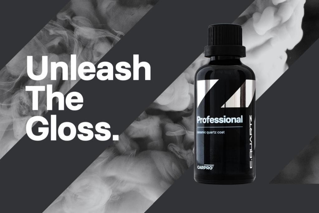 A dark bottle labeled “CQUARTZ Professional ceramic quartz coat” stands against a smoky, dramatic background. Bold white text on the left reads “Unleash The Gloss,” highlighting the product's promise of a high-shine finish.